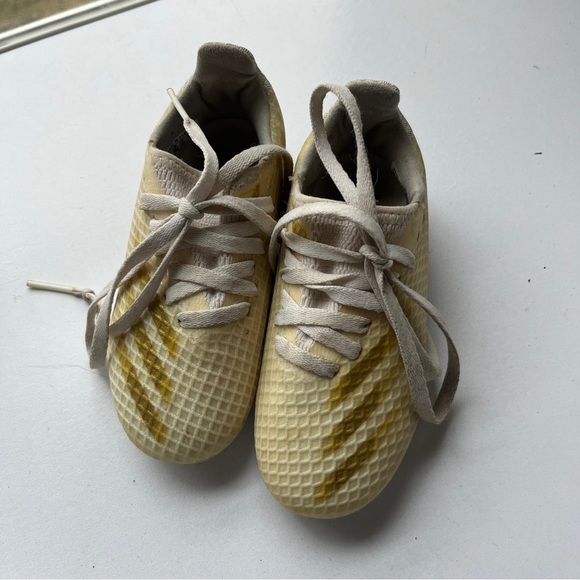 Adidas Ghosted 3 Kids Cream and Gold soccer cleats with Honeycomb Texture - Picture 1 of 5